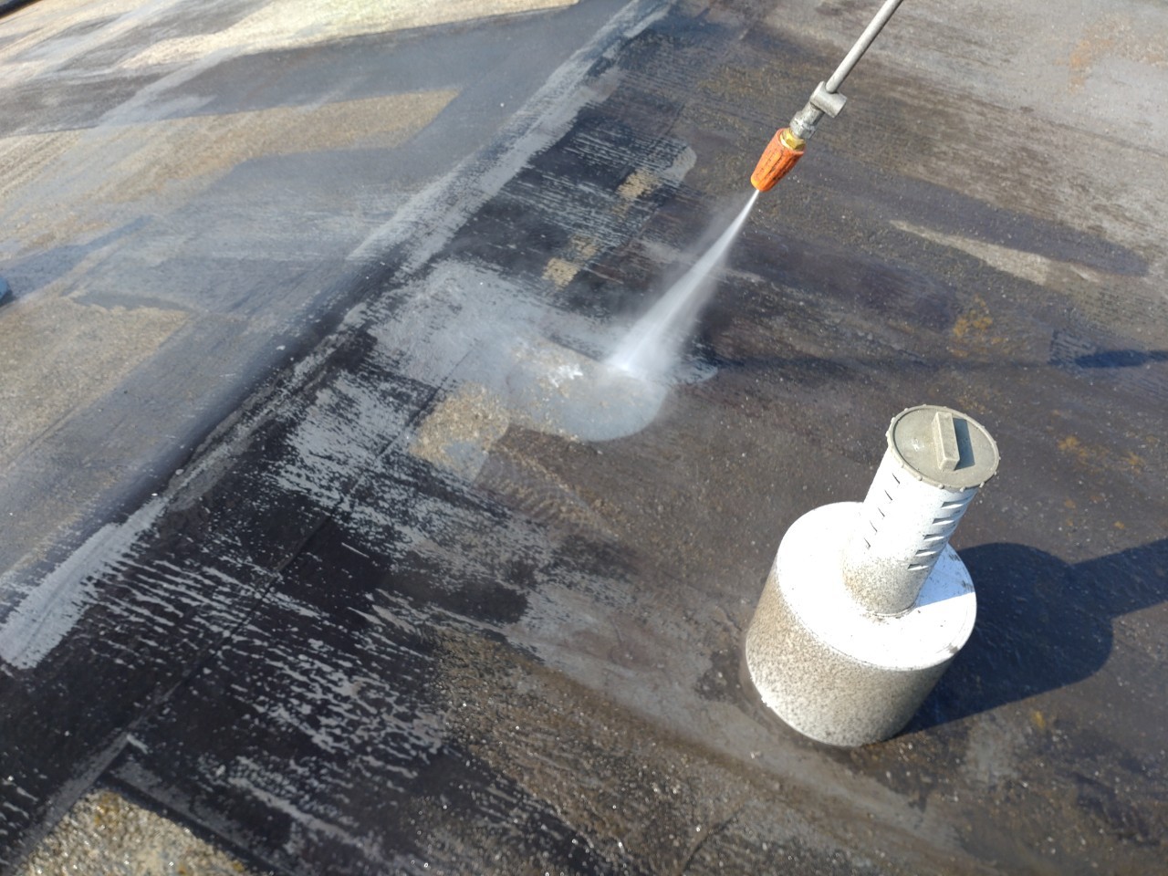 ①高圧洗浄の詳細写真